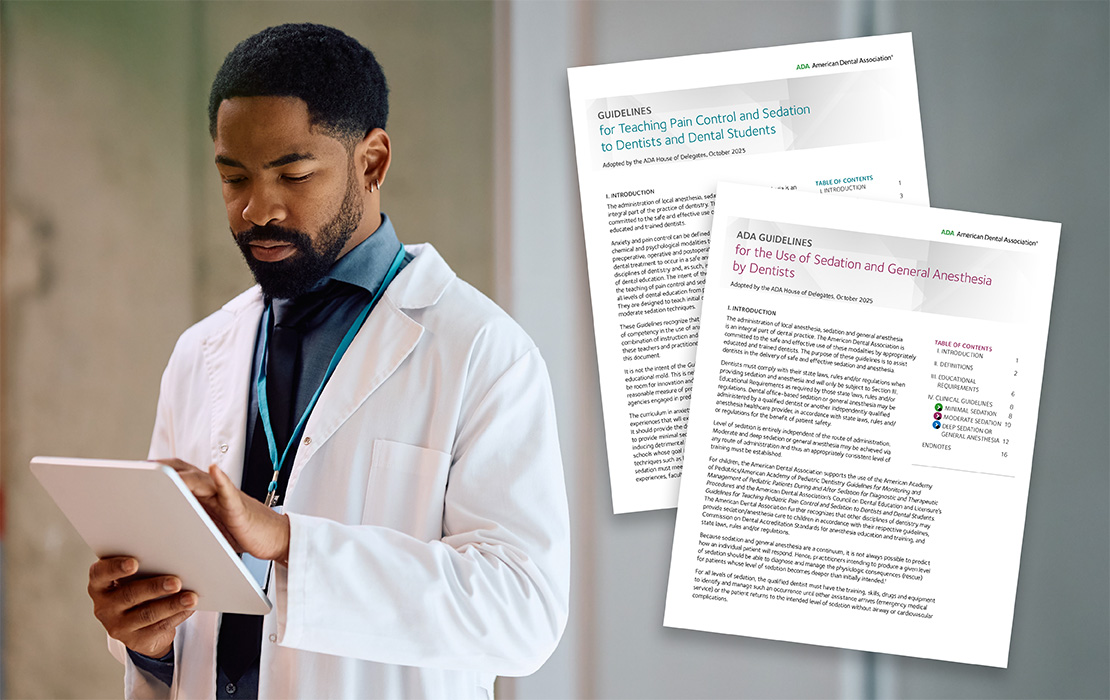 Dentist reading Updated Sedation Guidelines