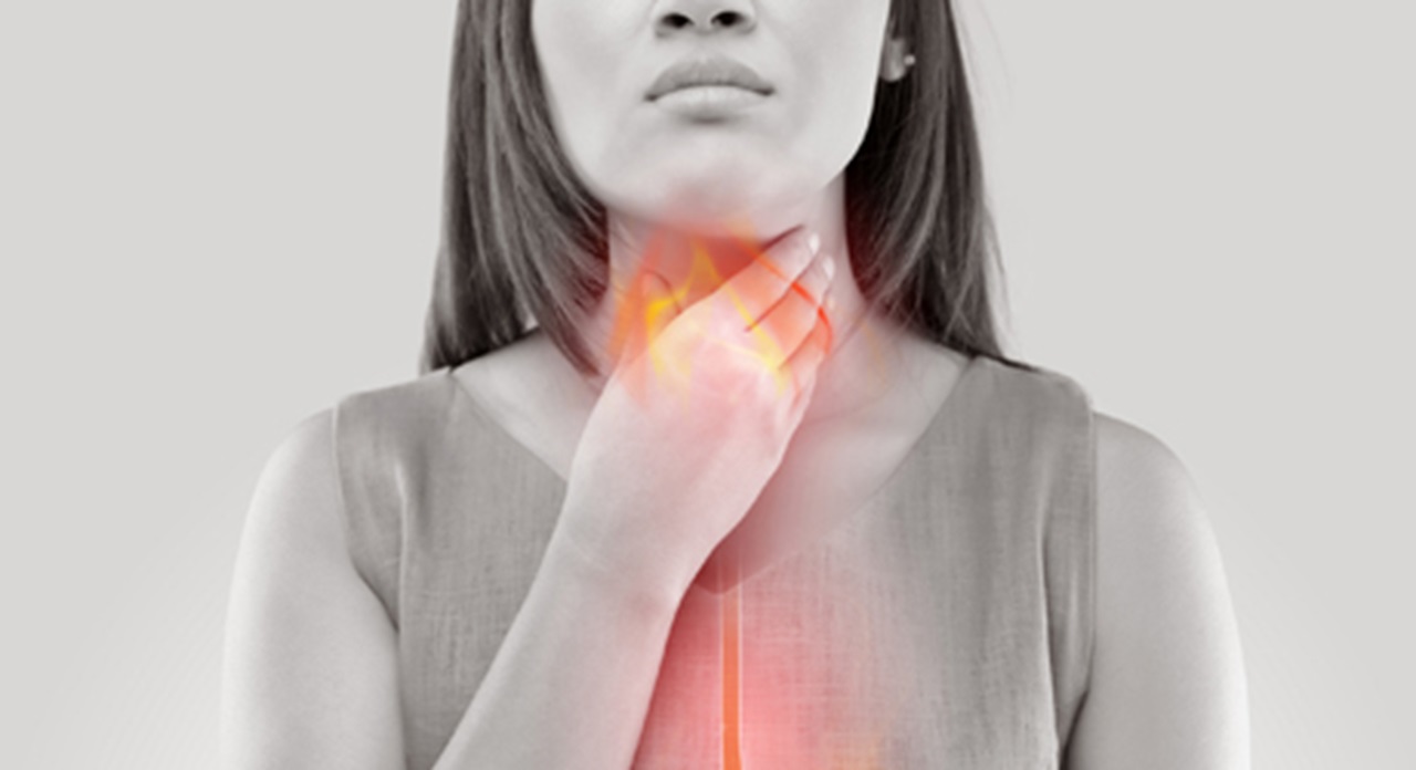 Gastric acid traveling up into a woman's mouth