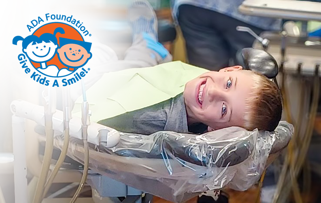 Give Kids a Smile child in dentist chair