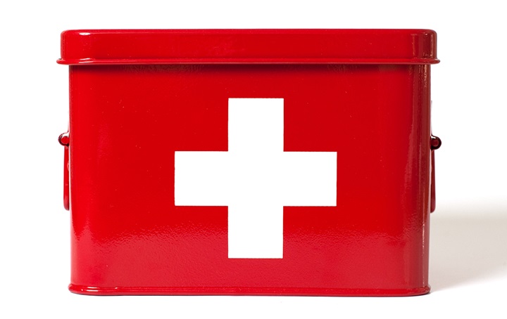 The red cross emblem on a emergency kit tin