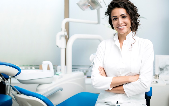 Female dentist in clinic office
