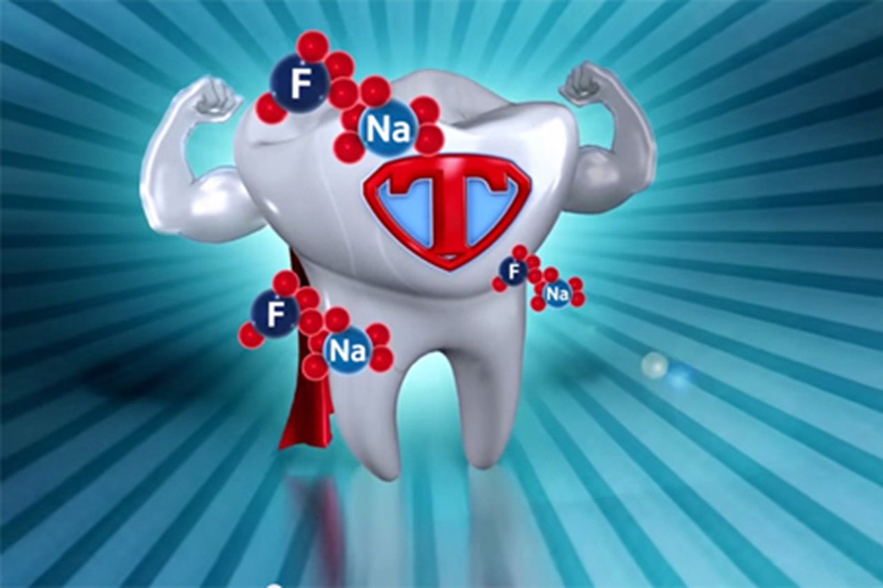 How fluoride helps a tooth get stronger.