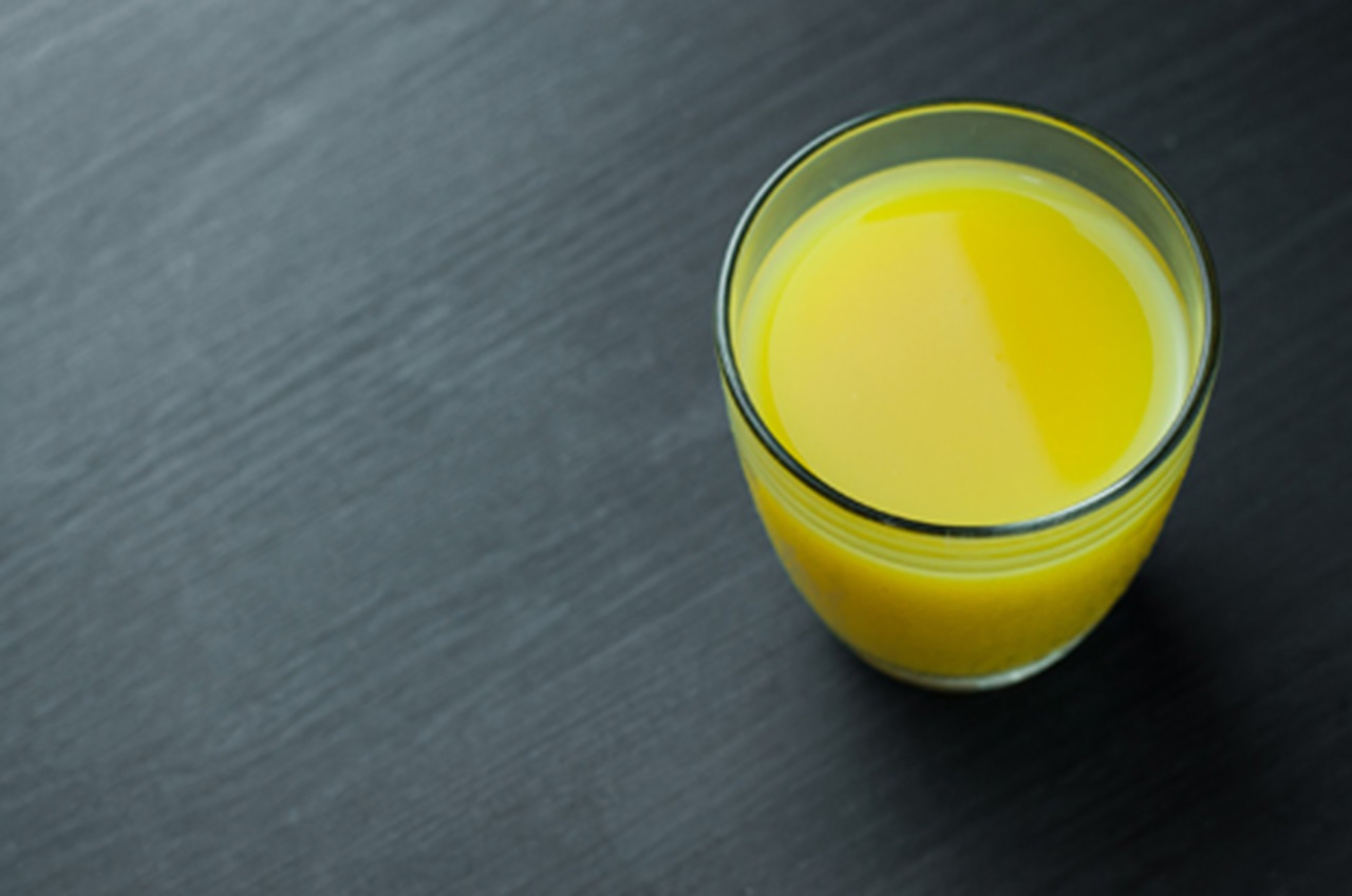 Glass of orange juice.