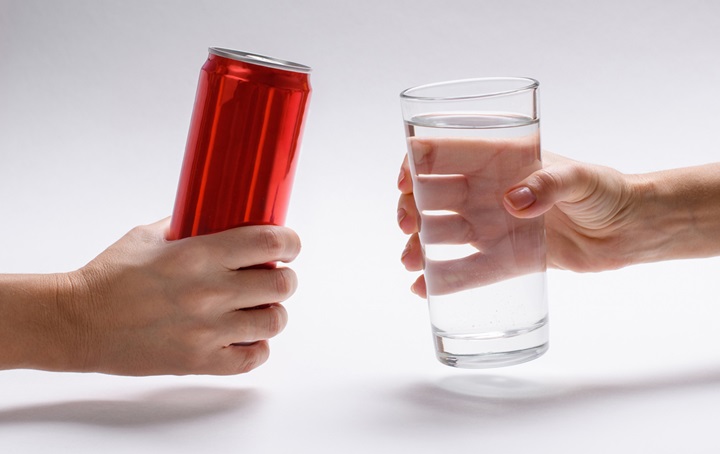Picture of soda can and glass of water