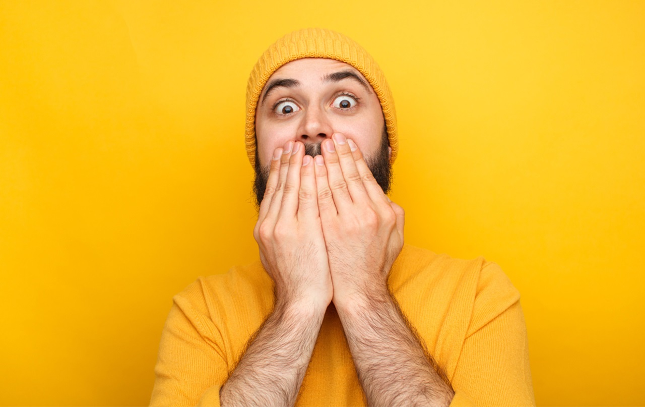 Be prepared, not scared. Man covering his mouth.