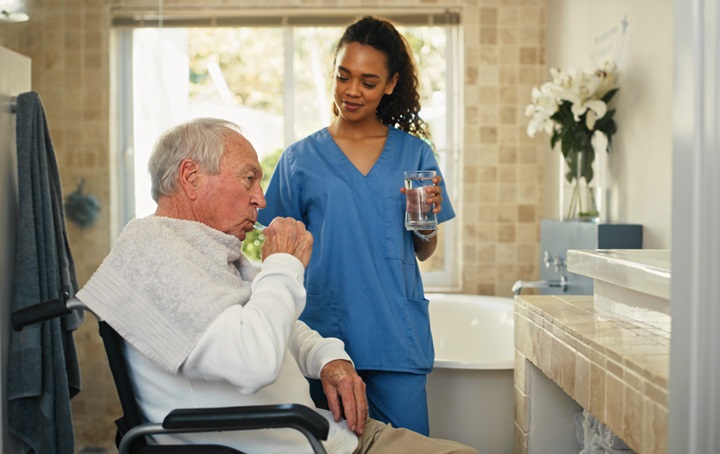 A caregiver having a discussion with a patient.