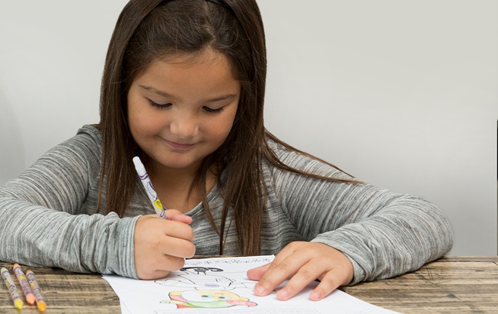 Image of child coloring a picture