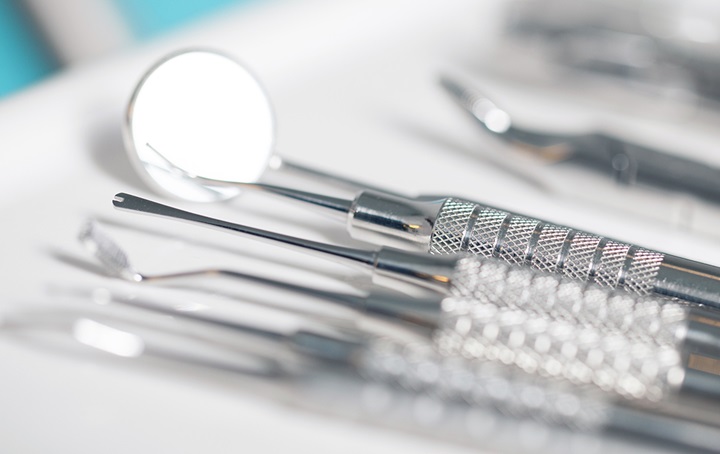 Closeup of tray of dental instruments