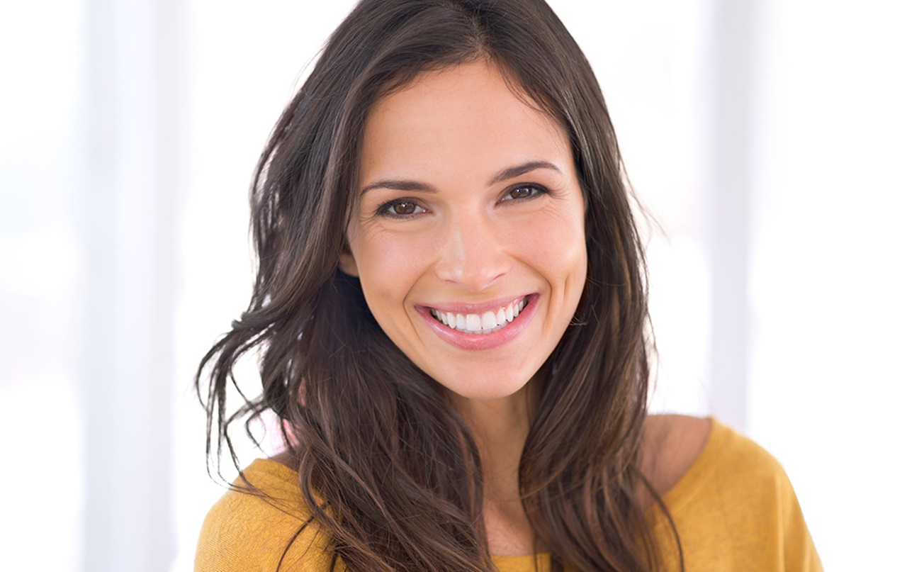 MouthHealthy woman shows teeth whitening