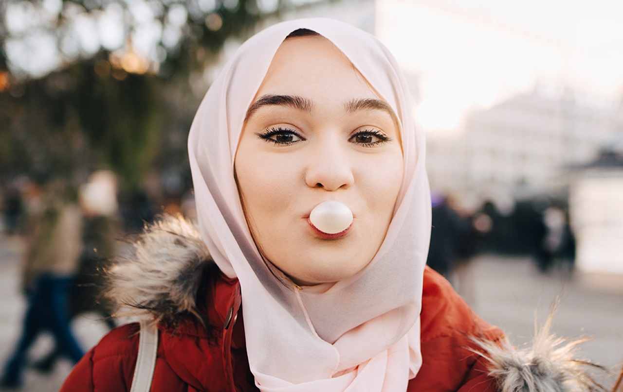 Mouth Healthy girl chewing bubble gum