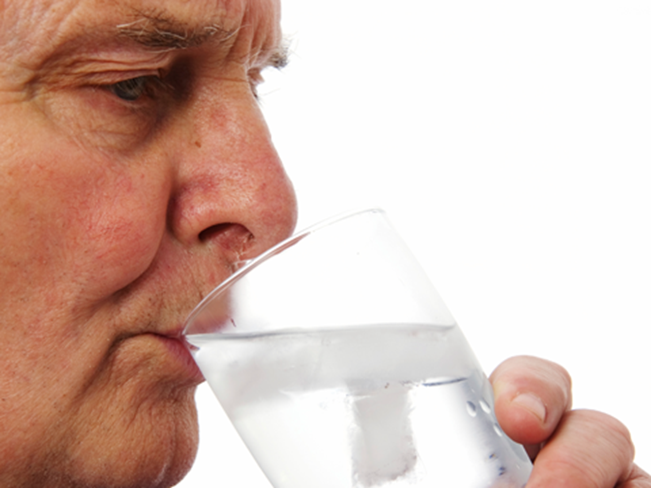 Image of older man drinking water