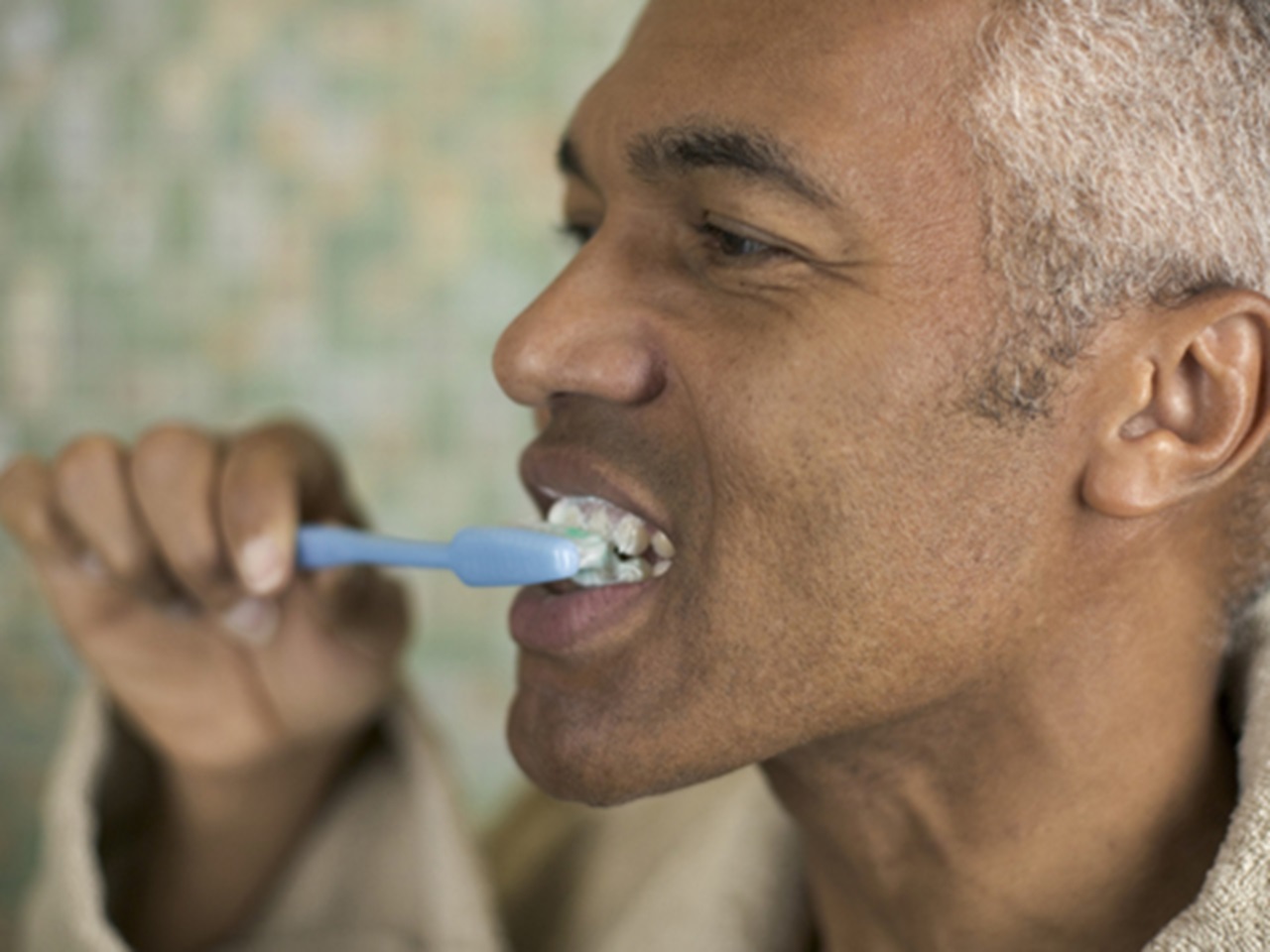 Man brushing teeth
