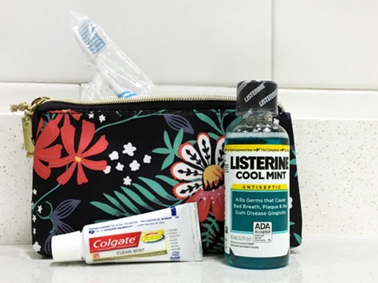 Travel bag with ADA Seal products