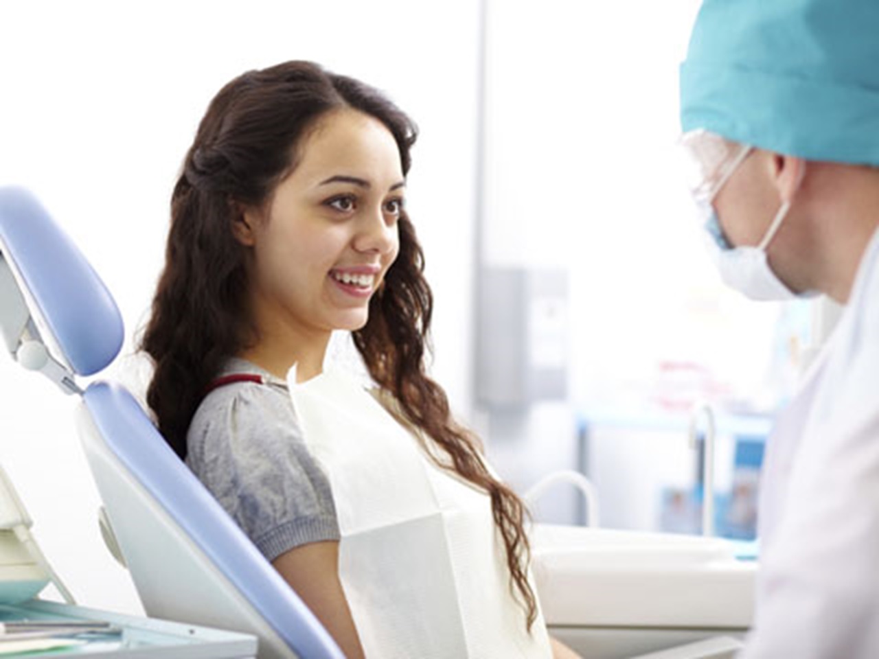 Woman talking to her dentist